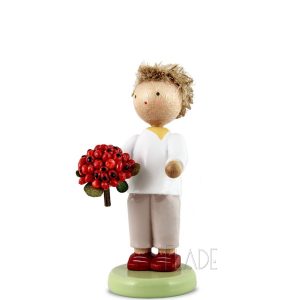 Junge mit Vogelbeeren